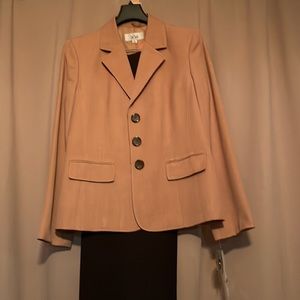 Le Suit Lined blazer with dark brown pants.